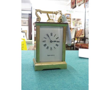 A MAPPIN AND WEBB GLASS CASED CARRIAGE CLOCK WITH KEY
