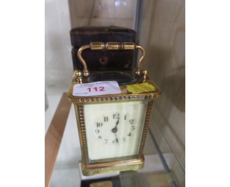 BRASS CARRIAGE CLOCK WITH FITTED LEATHER CLAD CARRY CASE