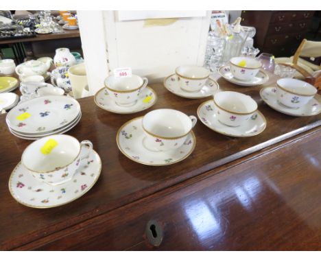 GERMAN PORCELAIN COFFEE CUPS DECORATED WITH FLOWERS AND WEDGWOOD CUPS AND SAUCERS
