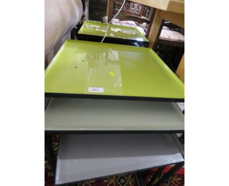PAIR OF NESTS OF THREE TABLES WITH COLOURED ENAMEL TOPS