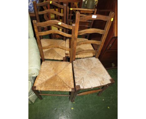 PAIR OF OAK FRAMED RUSH SEATED LADDER BACK CHAIRS TOGETHER WITH TWO OTHER RUSH-SEATED CHAIRS