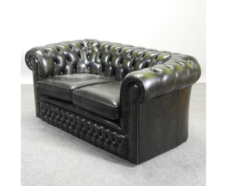 A modern green leather upholstered button back chesterfield sofa, 156cm