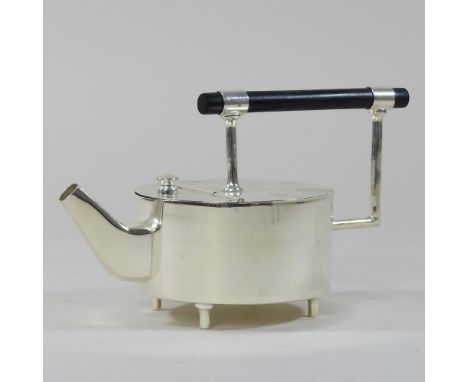 A modern plated teapot, in the Christopher Dresser design, 13cm high