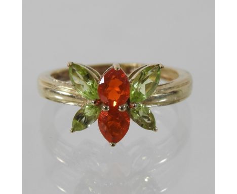 A 9 carat gold Mexican fire opal and peridot ring, boxed