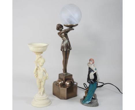 An Art Deco style figural table lamp, and shade, 54cm high overall, together with two figures