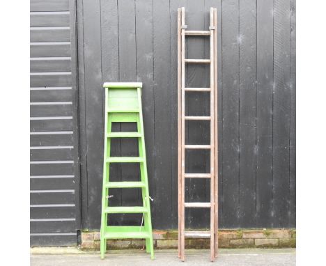 A wooden step ladder, 152cm high, together with an extending wooden ladder