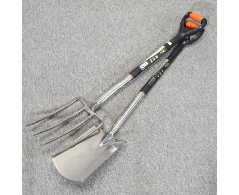 A stainless steel fork and spade