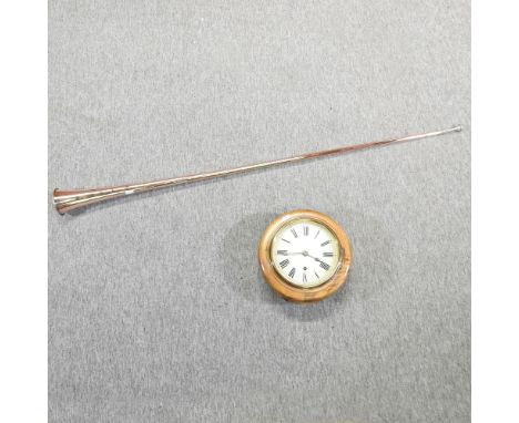 An early 20th century walnut wall clock, 27cm, together with a copper and brass mounted hunting horn, 132cm long
