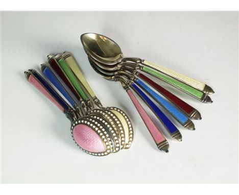 A set of twelve American silver gilt and enamel spoons, Watson Company, Massachusetts, comprising six pairs each with guilloc