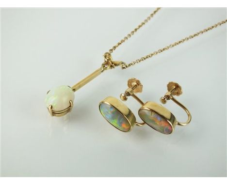 A pair of opal earrings, each designed as an elongated oval cabochon opal collet set in yellow metal, with screw fittings, st