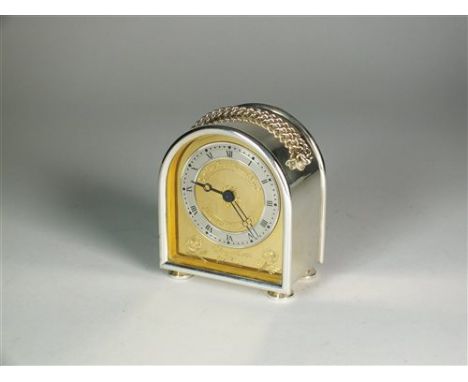 An Elizabeth II commemorative silver carriage clock, TC, London 1980, by Charles Frodsham, the silver and gilt dial with Roma