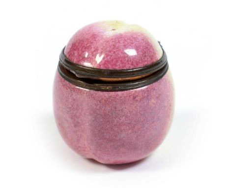 A South Staffordshire enamel apple bonbonnière, naturalistically modelled and painted in pink and creamy yellow, metal mount,
