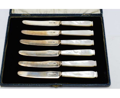 A set of six George VI tea knives, with silver blades by James Dixon &amp; Sons, Sheffield 1939, fitted mother of pearl handl