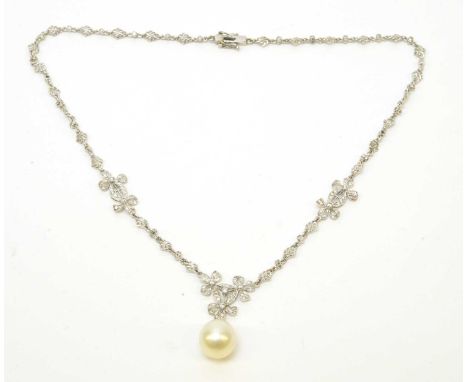 A diamond necklace with cultured pearl drop, the pearl drop measuring 13.25 x 11.68mm, suspended by a trefoil of diamond-set 