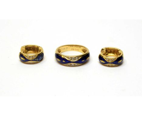 A Faberge ring, decorated in blue enamel and set with six graduated diamonds, in 18ct yellow gold mount and shank, limited ed