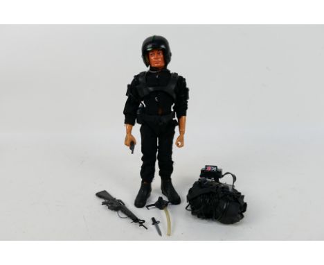 Palitoy - Action Man - A vintage Palitoy Action Man SAS Parachute Attack figure. The brown flock head eagle eye figure with g