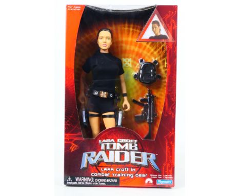 Playmates - An unopened Lara Croft Tomb Raider figure # 172121. The figure in training gear appears Mint in a Very Good 2001 