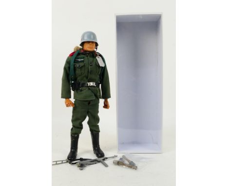 Palitoy - Action Man - A Palitoy brown flock head Action Man German Stormtrooper figure. The figure with hard hands, is marke