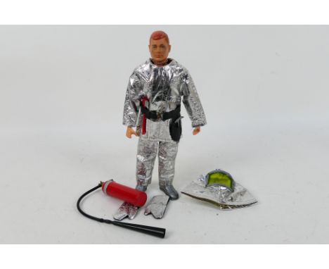 Palitoy - Action Man - A vintage unboxed painted soft red headed Action Man dressed in Crash Crew outfit. The hard hand figur