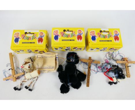 Pelham Puppets - Three boxed standard Pelham Puppets. Lot consists of A4 Poodle; A8 Cat; and A5 Foal. Puppets show signs of l