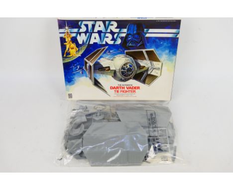 Denys Fisher - Star Wars - An boxed Darth Vader Tie Fighter model kit. The parts and instructions are still sealed in a bag a