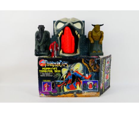 LJN Toys - Thundercats - A boxed Thundercats Mumm-Ra's Tomb Fortress # 3565. The model and figure appear in Very Good conditi