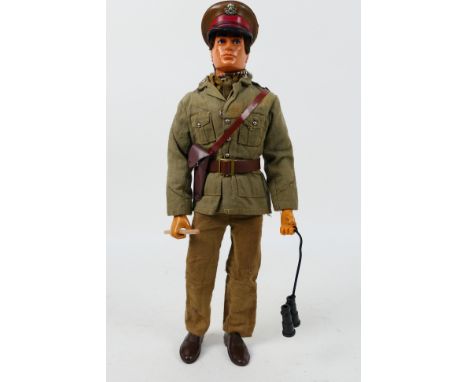 Palitoy, Action Man - A Palitoy Action Man in British Army Officer outfit. The brown flock haired, eagle-eye figure with grip