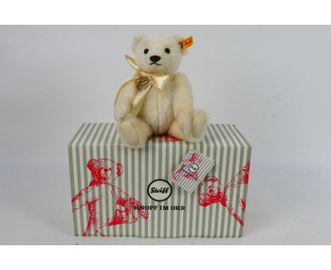 Steiff - Memories. A boxed and in opened bag Steiff 'Memories' bear, white tag 664601, Cream Mohair, no certificate, Excellen