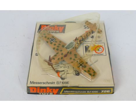 Dinky - A boxed Dinky Messerschmitt B.f 109E # 726 in desert camouflage. The model appears in Very Good condition with light 
