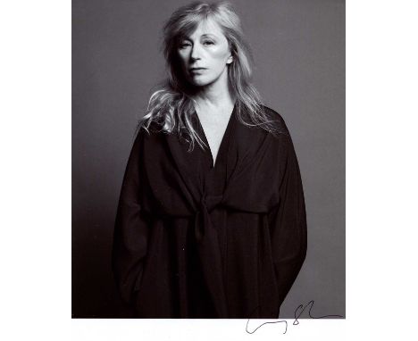 SHERMAN CINDY: (1954- ) American Artist. Best known for her photographic self-portraits. Signed 8 x 10 photograph by Sherman,