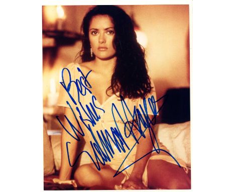 HAYEK SALMA: (1966- ) Mexican actress. Signed colour 8 x 10 photograph of Hayek seated in a three-quarter length pose. Signed
