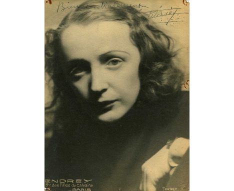 PIAF EDITH: (1915-1963) French singer, one of the most celebrated performers of the 20th century. Vintage signed sepia 7 x 9.