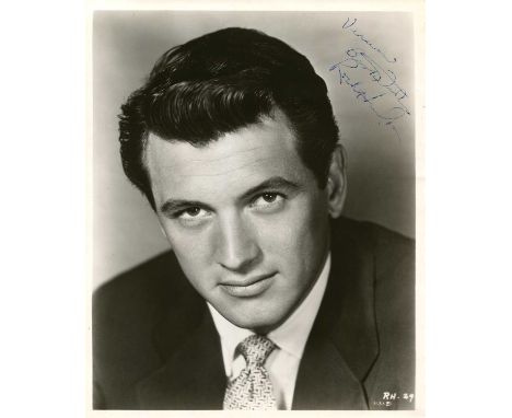 HUDSON ROCK: (1925-1985) American actor. Vintage signed and inscribed 8 x 10 photograph of Hudson in an engaging close-up hea