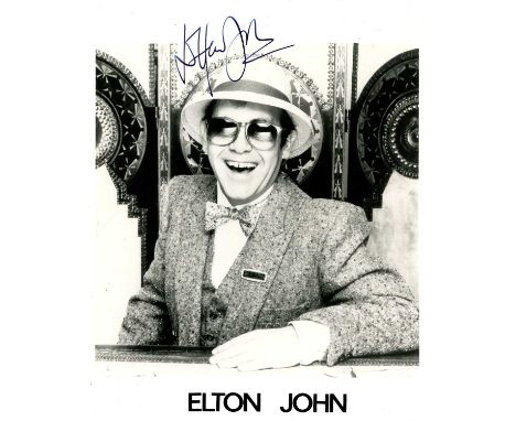 JOHN ELTON: (1947- ) British singer and pianist, Academy Award winner. An excellent signed 8 x 10 photograph of John in a typ