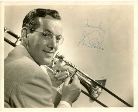MILLER GLENN: (1904-1944) American big band trombonist and bandleader. Vintage signed sepia 10 x 8 photograph of Miller in an
