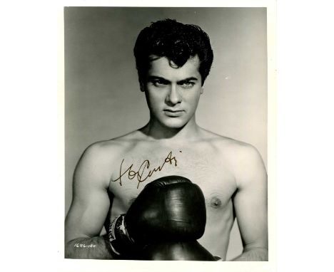 CURTIS TONY: (1925-2010) American actor. Signed 8 x 10 photograph of Curtis standing in a bare-chested half-length pose, wear