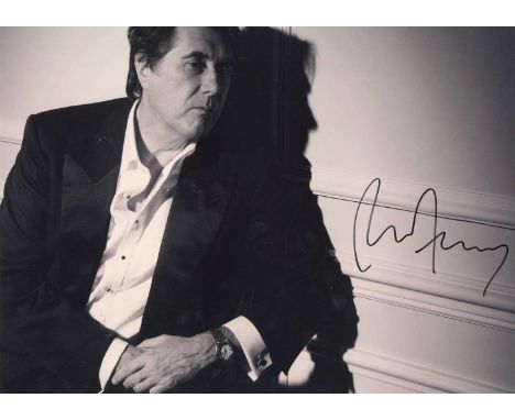 FERRY BRYAN: (1945- ) English singer and songwriter. Signed 16 x 12 photograph, the atmospherically lit image showing Ferry s
