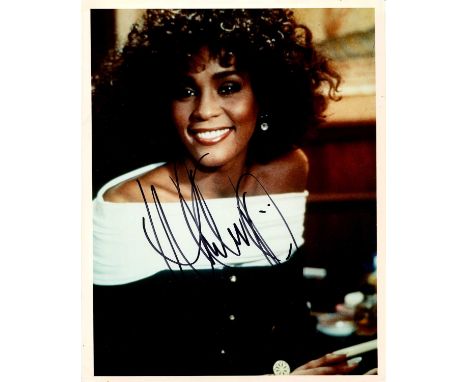 HOUSTON WHITNEY: (1963-2012) American singer and actress. Signed colour 8 x 10 photograph of Houston in a smiling half-length