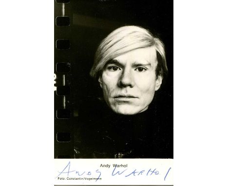 WARHOL ANDY: (1928-1987) American pop artist. An excellent vintage signed postcard photograph of Warhol in a head and shoulde