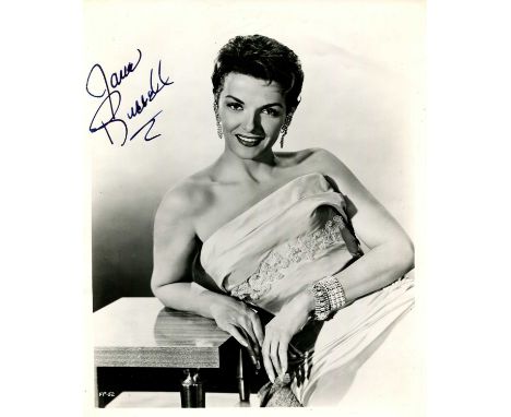 RUSSELL JANE: (1921-2011) American actress and sex symbol. Signed 8 x 10 photograph of Russell seated in a three-quarter leng