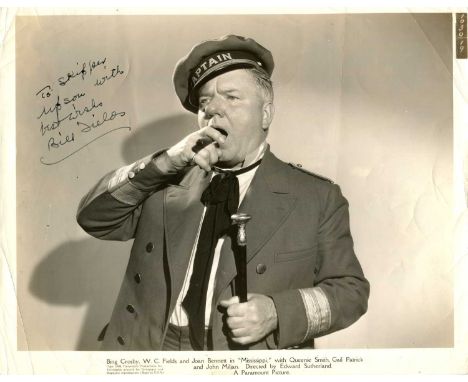 FIELDS W. C.: (1880-1946) American film comedian. Vintage signed and inscribed sepia 10 x 8 photograph of Fields standing in 