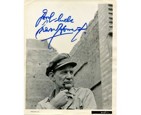 HOWARD TREVOR: (1913-1988) English actor. Signed 8 x 10 photograph of Howard in a head and shoulders pose outdoors, smoking a