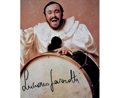 PAVAROTTI LUCIANO: (1935-2007) Italian tenor. Signed colour 8 x 10 photograph of Pavarotti standing in a half-length pose, in
