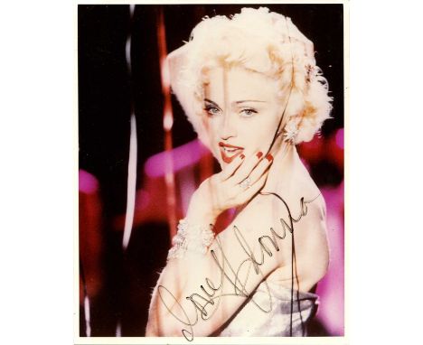 MADONNA: (1958- ) American singer and actress. Signed colour 8 x 10 photograph of Madonna in a head and shoulders pose, captu