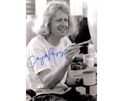PERRY GRAYSON: (1960- ) English artist, Turner Prize winner, 2003. Signed 8 x 11 photograph of Perry seated in a half-length 