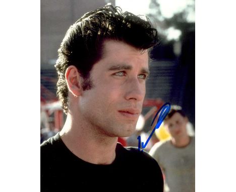 GREASE: John Travolta (1954- ) American actor. Signed colour 8 x 10 photograph of Travolta in a head and shoulders pose in co