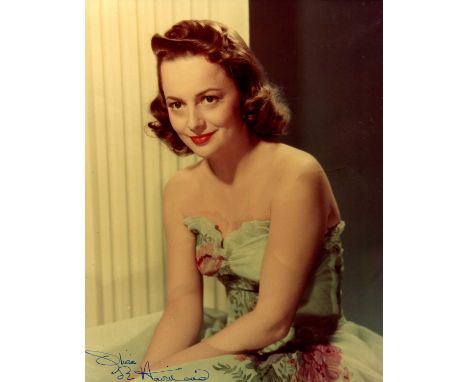 DE HAVILLAND OLIVIA: (1916-2020) British actress, Academy Award winner. Signed colour 8 x 10 photograph, an engaging image of