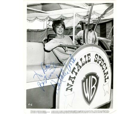 WOOD NATALIE: (1938-1981) American Actress. Vintage signed and inscribed 8 x 10 photograph of Wood seated in a half-length po