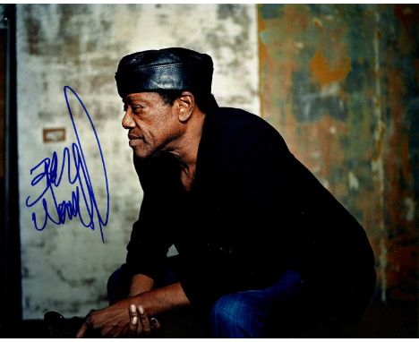 WOMACK BOBBY: (1944-2014) American singer and musician. Signed colour 10 x 8 photograph of Womack seated in a three-quarter l