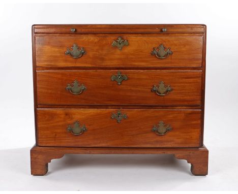 George III mahogany chest of drawers, the rectangular caddy top above a brushing slide and three long graduated drawers, 86cm